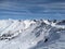 Panorama on Bulenhorn above Monstein. Ski touring in a beautiful mountain world. Hiking through deep snow.