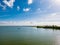 Panorama of calm IJsselmeer lake and artificial island Kornwerderzand, Netherlands