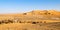 Panorama of Camel caravan ready to go in the sahara desert