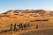 Panorama of Camel caravan in the sahara desert