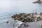 Panorama of the Camogli coast and beach with people.