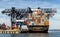 Panorama cargo ship and blue sky with light white clouds