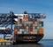 Panorama cargo ship loaded with colored containers at Hayes Dock