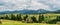 Panorama of Carpathian peaks and rural community