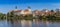 Panorama of the castle and old houses reflected in the lake in Telc