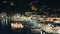 Panorama of the center of the night town of Sivota in the Greece.