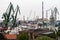 Panorama of the city of Gdansk. Port cranes on the background of city panorama.