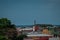 Panorama of the city of Limon in Costarica, view from the hill above the city, church and palm trees in the background with