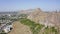 Panorama of the city of Osh from a bird`s-eye view. Sulaiman-Too is a rocky sacred mountain and a symbol of the city of Osh.