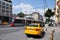 Panorama of the city street of Istanbul. Light rail and yellow taxi.