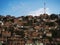 Panorama cityscape of colorful brick houses in Comuna 13 San Javier neighborhood poverty slum in Medellin Colombia