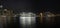 Panorama cityscape : Wonderful Night view of colourful city and cruise ship near Harbor Bridge at Sydney, Australia. View at Sydne