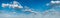 panorama of clouds on blue sky. Background, wallpaper. Gradient transition from dark to light. Weather forecast