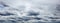 Panorama of cloudy grey sky