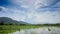 Panorama of Cloudy Sky over Rice Field in Water Hills Village