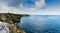 Panorama coastal landscape with cliffs and a lighthouse