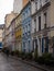 Panorama cobblestone pedestrian street view of colorful houses exterior building facades in Rue Cremieux Paris France