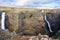 Panorama of colorful gorge with four waterfalls Haifoss, the fourth highest waterfall(122m) of the island, and Granni. The