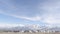 Panorama crop Panoramic view of South Jordan City neighborhood and Wasatch Mountains in winter
