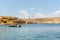 Panorama of the crystal clear blue waters of Santa Maria Beach in Santa Marija Bay, Comino, Malta.