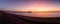 Panorama of Deal Pier and the beautiful beach during an amazing clear skies sunrise