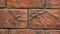 Panorama of decorative stone. Move up the granite to the house. Wall of stone.