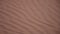 Panorama design of the rippling textured sand dunes background in the beautiful sunshine in the United Arab Emirates.