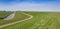 Panorama of a dike in the landscape of Groningen
