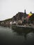 Panorama of Dinant citadel old town historic village with belgian flag on Meuse river Ardennes Namur Wallonia Belgium