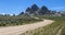 Panorama of a dirt road leading to granite outcroppings at the City of Rocks National Reserve, Idaho, USA