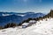 Panorama of the Dolomites with wood cottage, snowy mountains and