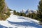 Panorama of the Dolomites with wood cottage, snowy mountains and