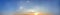 Panorama of Dramatic vibrant color with beautiful cloud of sunrise and sunset.