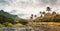 Panorama of dried-up stream surrounded by fertile green valley and rugged cliffs. Santo Antao, Cabo Verde