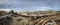 Panorama of driftwood covering beach after Oregon storm