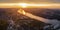 Panorama of the evening city of Krasnoyarsk, the Yenisei river at sunset, suburbs. city buildings view from above