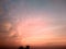 Panorama of Evening Sunset with a perfect orange yellow dark colourfull but cloudy sky landscape view