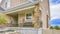 Panorama Exterior of a home with plants grasses and stones on the landscaped yard