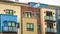 Panorama Exterior of townhouses in Park City Utah with balconies and snowy roof in winter