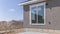 Panorama Exterior view of a house under construction against pale blue sky