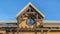 Panorama Facade of a rustic building against vivid blue sky on a sunny day