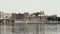 Panorama of famous tourist landmark Udaipur City: houses, ghat and City Palace on the bank of lake Pichola. Rajasthan, India.