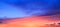 Panorama fantasy twilight dawn background, Gold sunlight on blue sky and moving soft purple clouds above before sunset