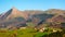 Panorama of farms in Lazkaomendi in Gipuzkoa with Txindoki