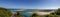 panorama of flat sand dunes at delta of Nambucca river entering Pacific ocean through wide sandy beach of Australian coast around