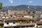 Panorama of Florence with the Basilica of Santa Croce and residential buildings with balconies decorated with flowers. Tuscany