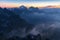 Panorama with fog and mountains in Banff, Alberta. Morning landscape with misty atmosphere. Beautiful nature background.