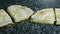 Panorama of four pieces of homemade lemon cake