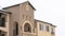 Panorama frame Apartment with snowy front gable roof and balustrade on the arched balcony