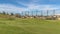 Panorama frame Focus on a sand trap surrounded by short green grasses at a sunny golf course